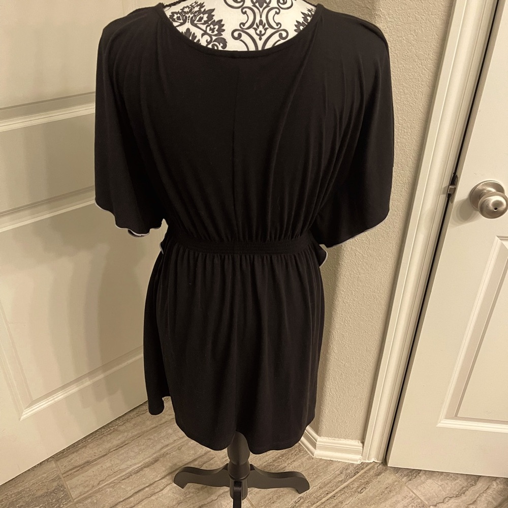 My Michelle women's top. Black with ivory trim. Ruffled